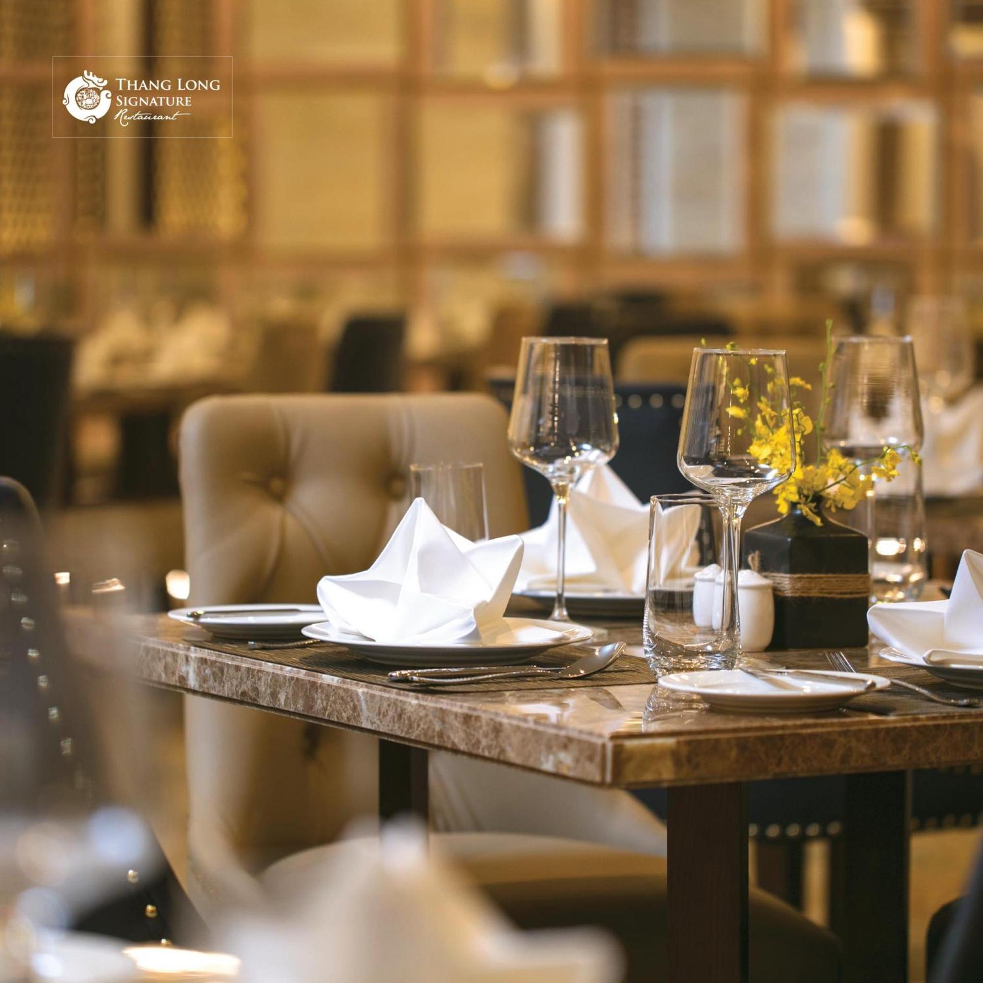 The Oriental Jade Hotel Hanoi Esterno foto A table set for fine dining